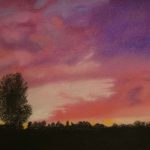 Pastel drawing of a landscape with a black treeline and a red, purple and orange sky at sunset.