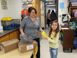 Student receives new dictionary