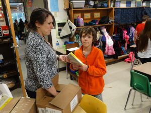 Student receives dictionary