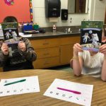 Two students reading books