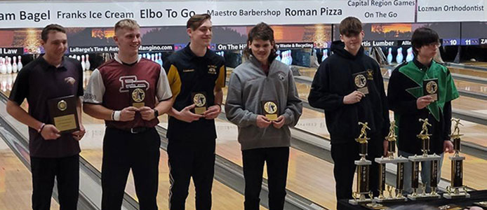 6 Bowlers with trophies