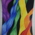 Student painting of ribbons using rainbow colors.