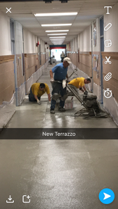 New terrazzo being installed at the elementary school entrance