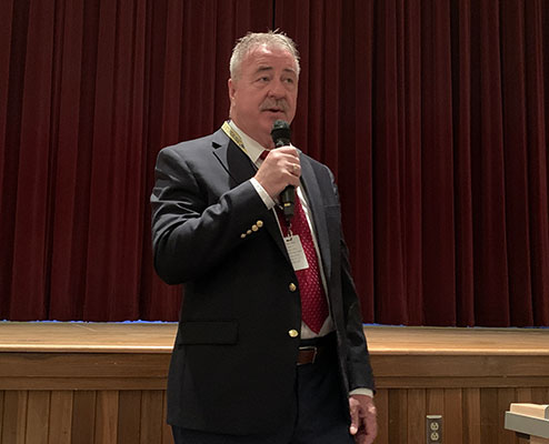 Superintendent Christopher Harper speaks at the assembly