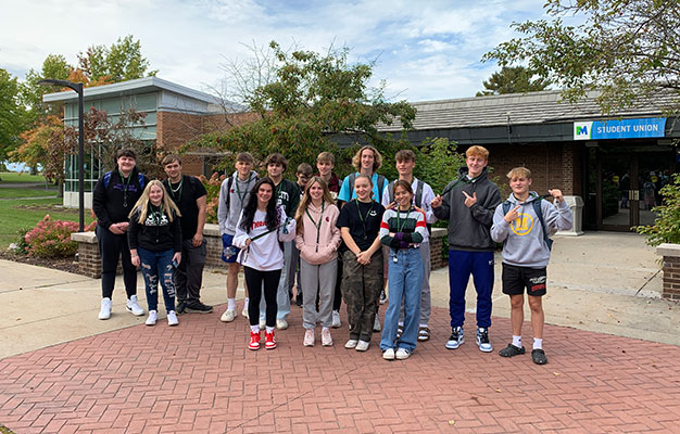 students at FMCC holding lanyards