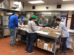 Rolling up their sleeves to pack lunches