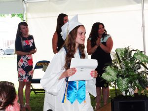 Student shows off diploma