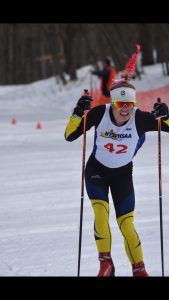 Skiing down the hill at the sate meet