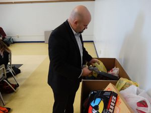 Assistant principal looking over gifts