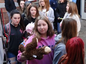 Student with a stuffed bear