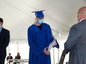 Student picks up diploma