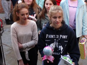 Two students bring gifts