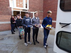 Students in line with gifts