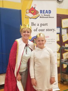 Principal Katria Hitrick stands with a student