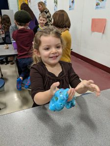 Student shows off her slime creation